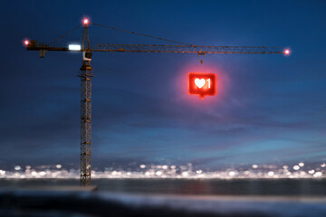 Construction crane with a social media symbol on the hook