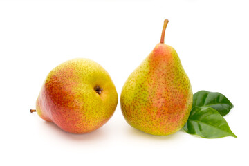 Fresh bio pear with leaves on isolated white background.