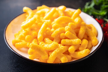 cheetos snack cheese corn sticks meal snack on the table copy space food background rustic. top view