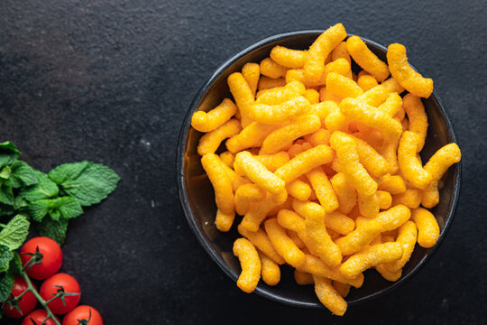 cheetos snack cheese corn sticks meal snack on the table copy space food background rustic. top view