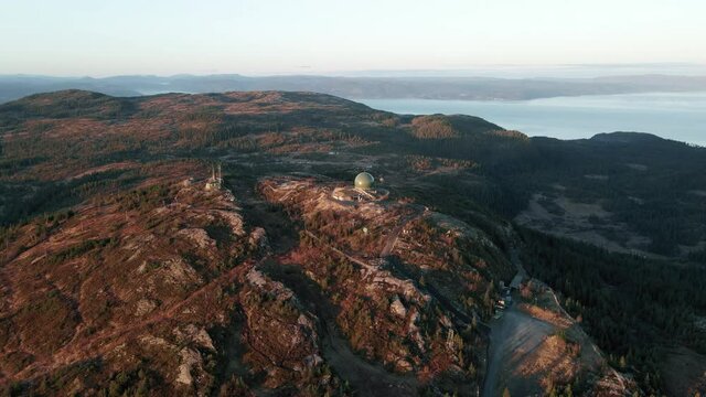 Abandoned Military Base At The Peak Of Grakallen Mountain In Trondelag County, Norway. aerial, orbit