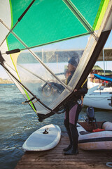 Windsurfer surfing on a windy day at the river.