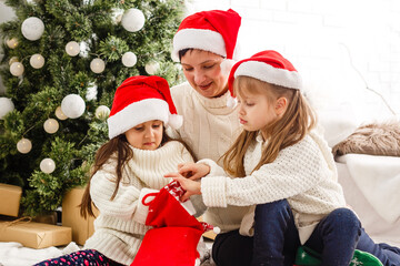 mother and children at home for christmas