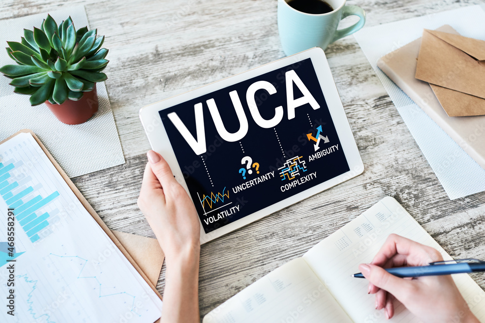 Poster vuca world concept on screen. volatility, uncertainty, complexity, ambiguity.