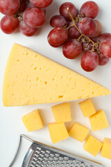 Concept of cooking eating with hard cheese, close up