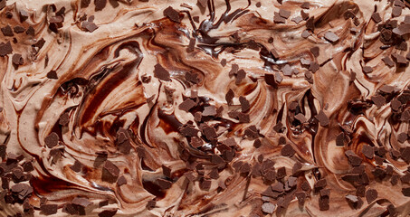 Tasty creamy chocolate ice cream topped with chocolate flakes