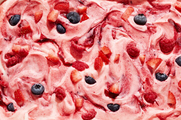 Gourmet berry ice cream with raspberry, strawberry and blueberry
