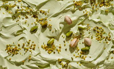Artisanal homemade green pistachio ice cream with fresh nuts