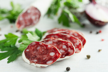 Сoncept of tasty food with salami sausage, close up