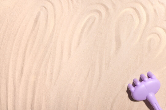 Sandbox outdoor. Children's sandbox with various toys for the game. Summer concept.