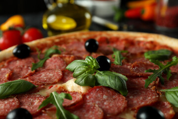 Concept of tasty food with Salami pizza, close up