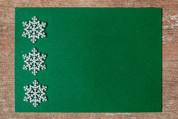 Christmas background with green  empty card.
Space of text;