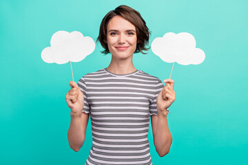 Photo of young girl happy positive smile weather forecast cloud stick isolated over turquoise color...