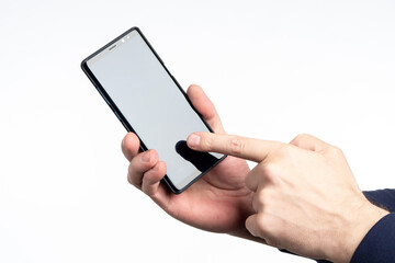 Hands show phone. Man points his finger at smartphone. Disabled cellphone for applications. Place to advertise applications. Space for mobile applications. Modern phone template.