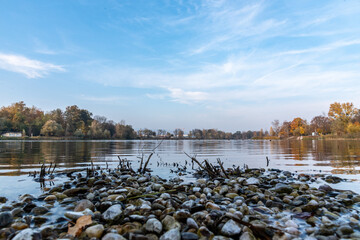 low shot of lake with rocks in the foreground © Redfox1980