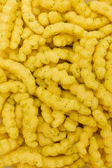 vertical food background: lentil chips with green onions