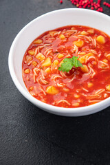 minestrone red tomato soup first dish meal snack on the table copy space food background rustic. top view keto or paleo diet veggie vegan or vegetarian food no meat