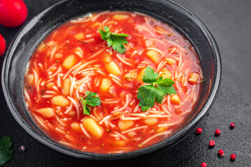 minestrone red tomato soup first dish meal snack on the table copy space food background rustic. top view keto or paleo diet veggie vegan or vegetarian food no meat
