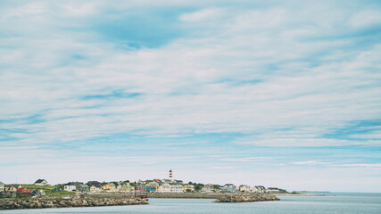 Alnesgard, Godoya, Norway. Old Alnes Lighthouse In Summer Day In Godoy Island Near Alesund Town. Alnes Fyr