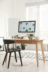 Stylish room interior with comfortable workplace. Home office