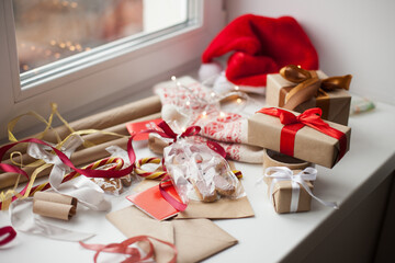 Fototapeta na wymiar Christmas gifts wrapping mess - mental health issues during holidays season