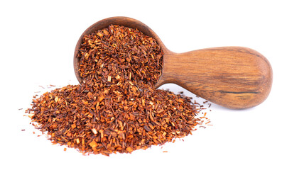 Rooibos red tea in wooden spoon, isolated on white background. Traditional herbal and organic tea.