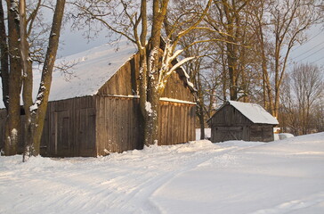 An old wooden shed on a sunny winter day.