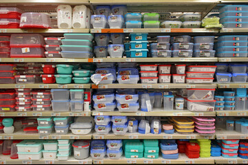 Stack of food tupperwares plastic containers displayed on a supermarket