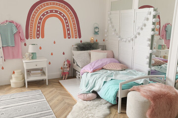 Modern girl's bedroom interior with stylish furniture. Idea for design