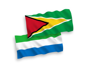 Flags of Co-operative Republic of Guyana and Sierra Leone on a white background