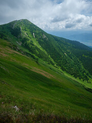 Fototapeta na wymiar misty mountain tops in Slovenia national park