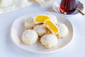 Lemon cookies. Chocolate-covered, lemon-filled cookie