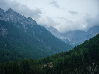 Fototapeta premium misty mountain tops in Slovenia national park