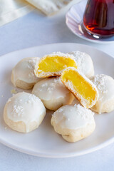Lemon cookies. Chocolate-covered, lemon-filled cookie. Story format