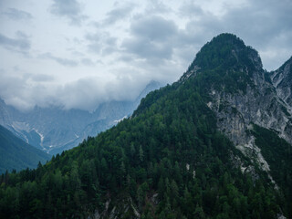 Fototapeta premium misty mountain tops in Slovenia national park