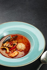 tom yum kung traditional thai asian spicy coconut milk soup with shrimps. Tom yum goong closeup