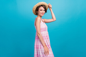 Profile photo of sweet young romantic lady wear panama pink long sarafan isolated on blue color background