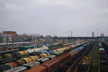 Fototapeta premium Freight wagons, transport, station and buildings