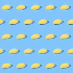 Seamless pattern made up of mango fruits with shadow cast to the right