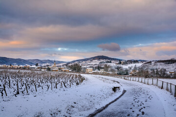 Village of Denice and landscape of Beaujolais under the snow