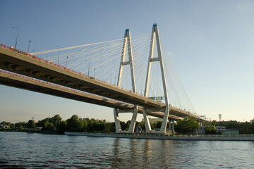 Modern road Vantovyi bridge across the river. Summer travel concept