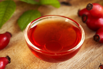 Rosehip seed oil with fresh ripe rosehips