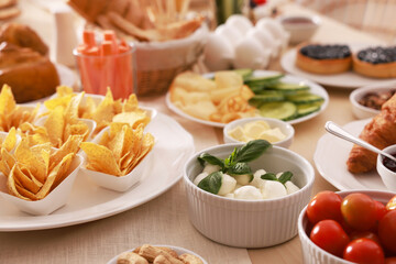 Dishes with different food on table. Luxury brunch