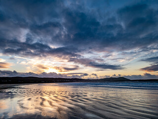 Dramatic sunset at Narin Strand by Portnoo, County Donegal in Ireland.