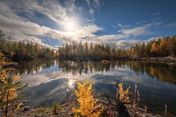 A fine sunny day was pleasing with colors on a small lake not far from Kem river