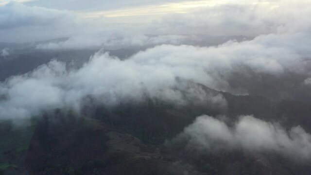 Low clouds drift across the rolling hills found east of San Francisco Bay, California. This region, dry much of the year, turns green during the winter months due to much needed rain.