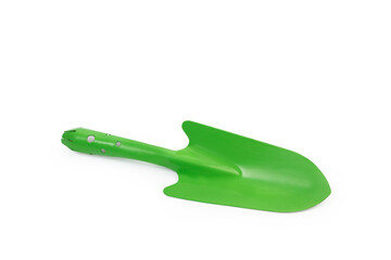Pala de jardin verde sobre un fondo blanco liso y aislado. Vista superior. Copy space