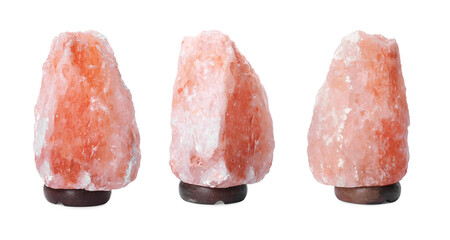 Set with pink Himalayan salt lamps on white background. Banner design