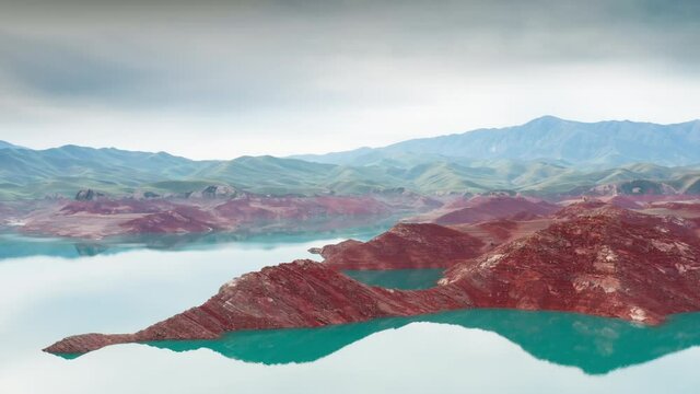 Aerial flight Beautiful spring landscape of river with blue turquoise water and hills against background of mountains and dawn sky. Bare rocky shores are visible due to ow water level on the lake.