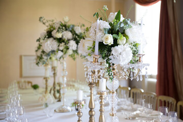 Wonderful flowers on a ceremony table in a villa